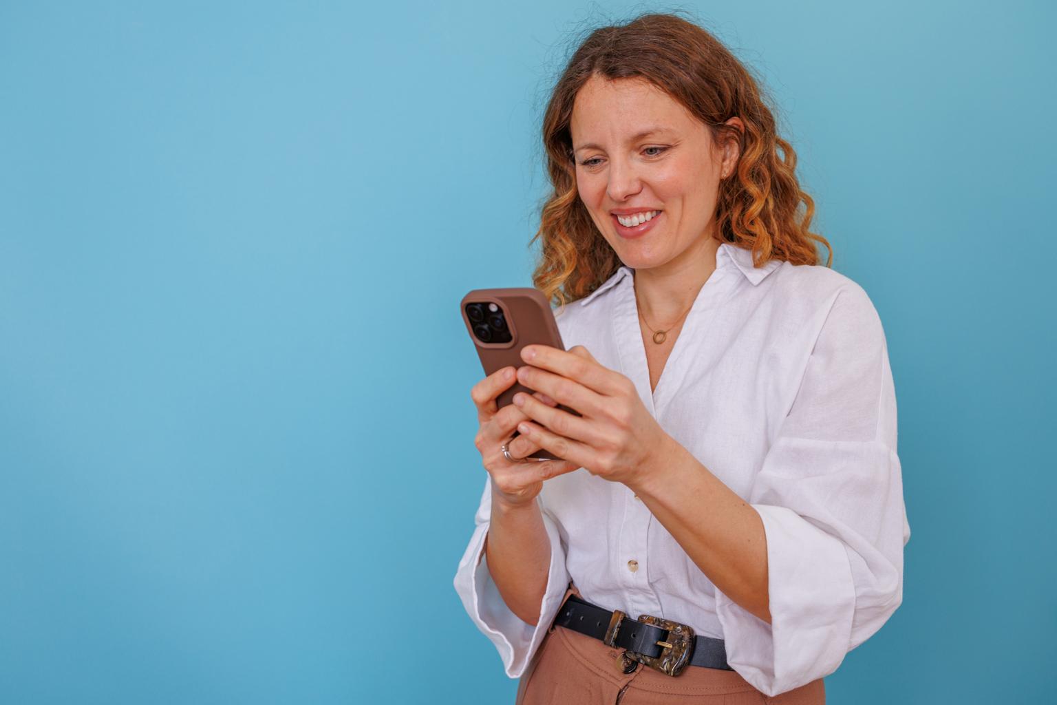 Person looking at their phone before a festival